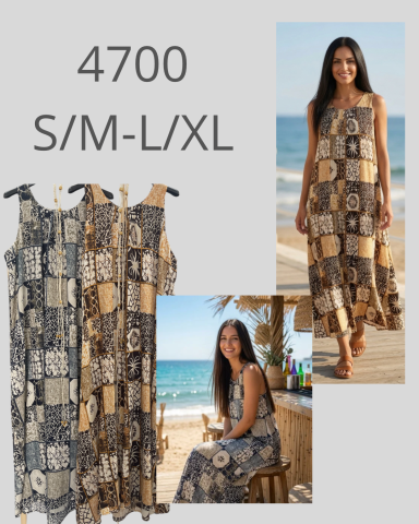 Vestido largo con estampado y disponible en tallas S/M y L/XL. Modelo junto al mar.