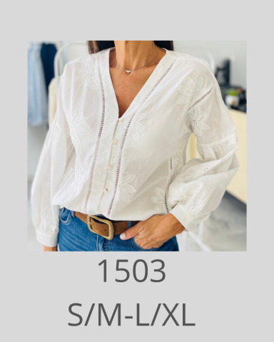 Camisa blanca con mangas abullonadas y botones, con un ajuste cómodo. Tallas S/M y L/XL.
