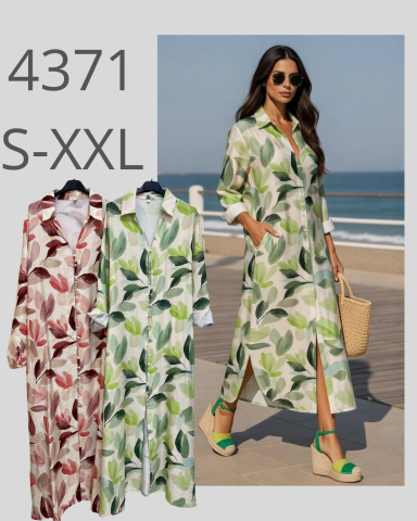 Vestido largo de estampado floral en tonos verde y rojo, con sandalias y bolso.