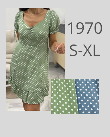 Vestido de estilo 1970 en verde con lunares blancos, disponible en tallas S-XL.