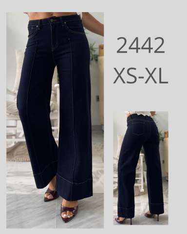 Pantalón vaquero ancho, color oscuro, disponible en tallas XS a XL.