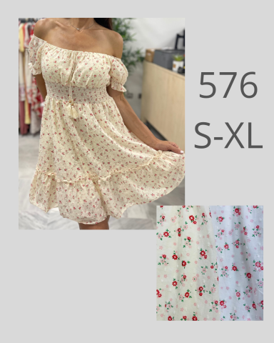 Vestido sin mangas con estampado de flores en tonos suaves y falda acampanada.
