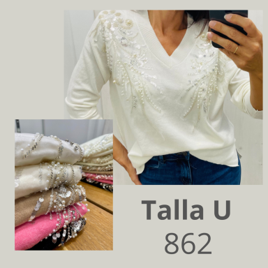 Blusa blanca con detalles bordados, disponible en tamaño U y color variantes.