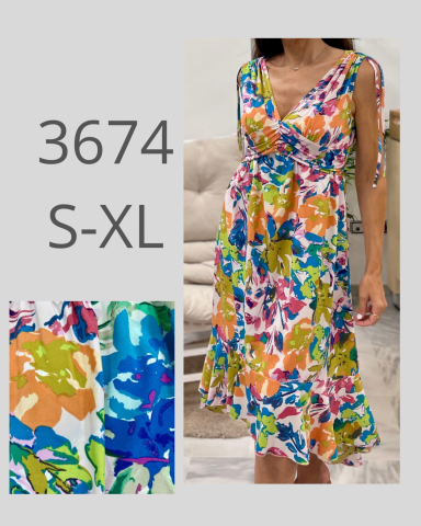 Vestido de verano colorido con estampado floral, disponible en tallas S a XL.