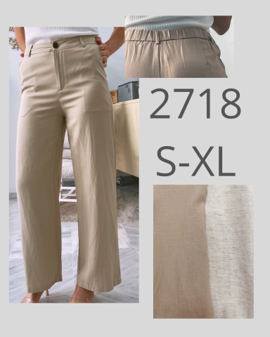 Pantalones beige de corte recto, disponibles en tallas S-XL, con detalle de costura.