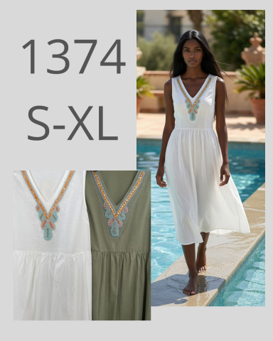 Vestido blanco con detalles en el escote, disponible en tallas S-XL.