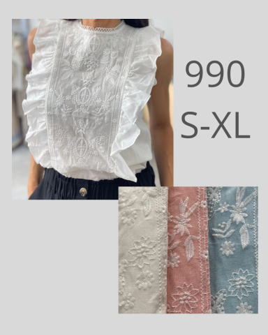 Blusa blanca con volantes, disponible en tallas S-XL y en tres colores: blanco, rosa y azul.