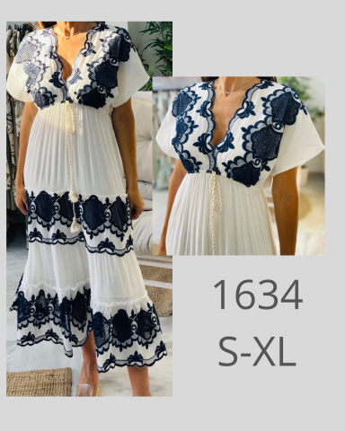 Vestido largo blanco con detalles en negro, disponible en tallas S-XL.